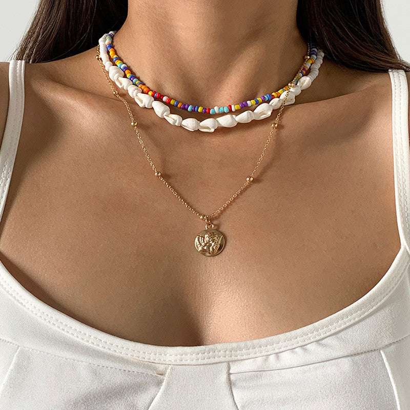 affordable boho necklace, beach holiday necklace, shell necklace - available at Sparq Mart