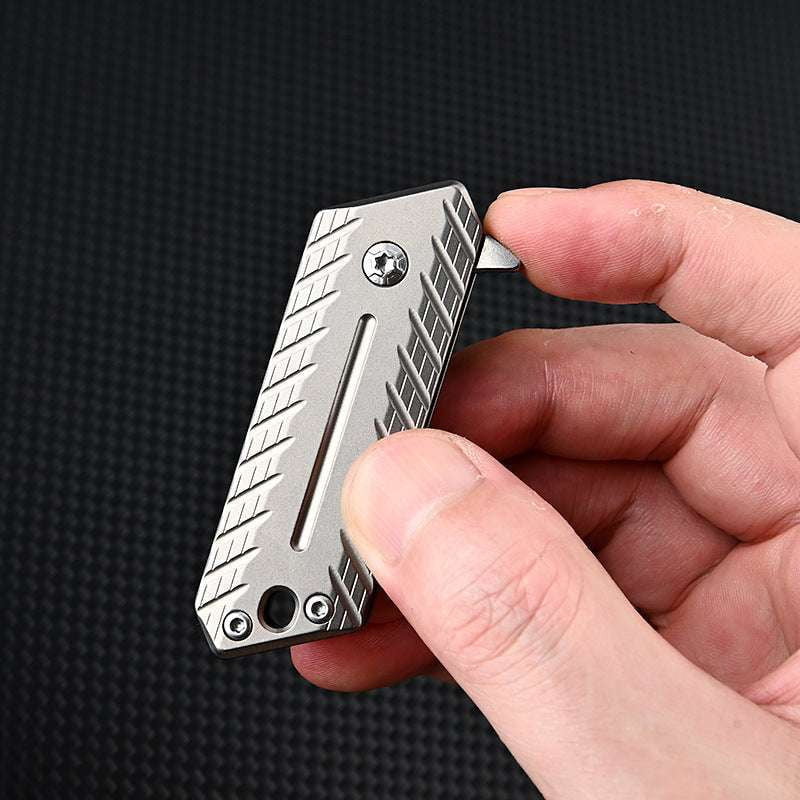 Compact Titanium Alloy Knife, Folding EDC Gear, Mini Keychain Knife - available at Sparq Mart