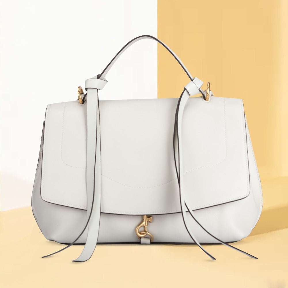 chic white handbags, leather clamshell handbags, summer handbag trends - available at Sparq Mart