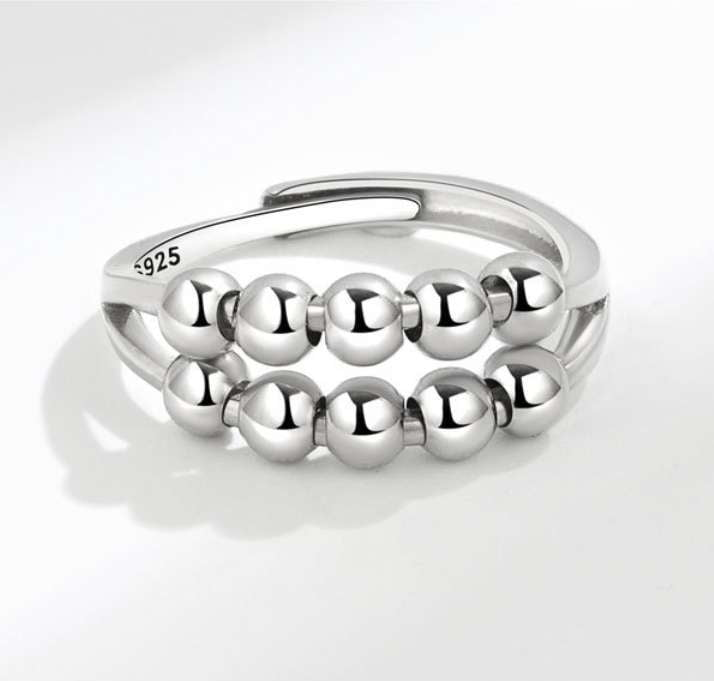 adjustable decompression ring, anxiety ring spinner, stress relief jewelry - available at Sparq Mart