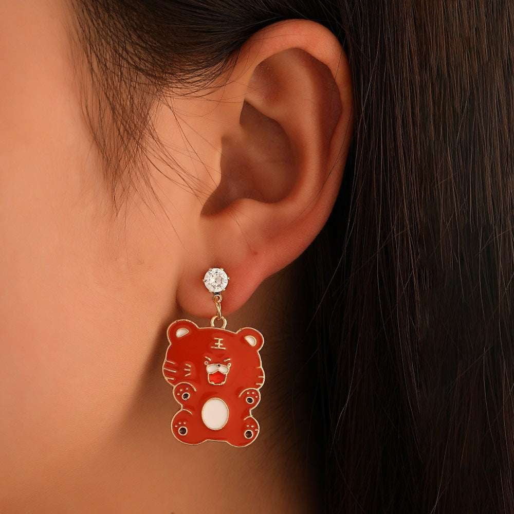 sparkling diamond jewelry, unique style earrings, zodiac tiger earrings - available at Sparq Mart