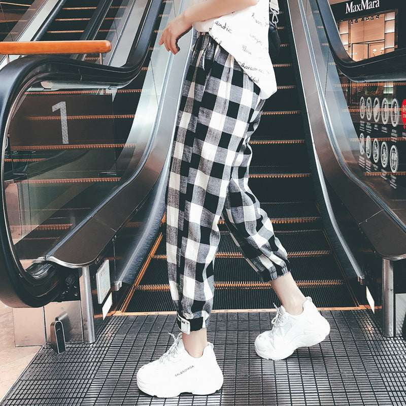 Fashionable checkered bottoms, Trendy plaid trousers, Versatile plaid pants - available at Sparq Mart